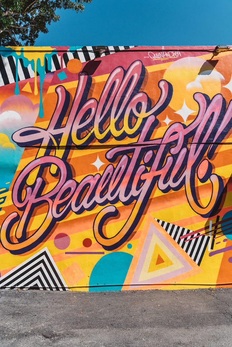 Opening messages that work on Ashley Madison include more than this colorful street art saying "Hello Beautiful." You have to connect with her.