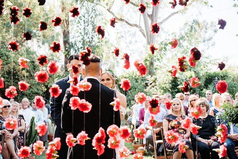 carnation backdrop - http://ruffledblog.com/fiesta-inspired-san-diego-wedding
