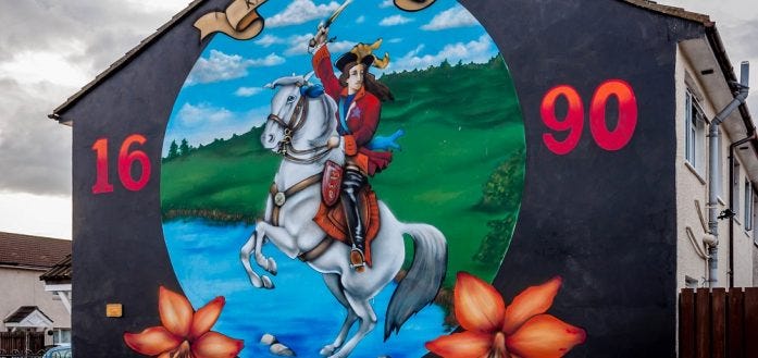 No Belfast city travel guide would be complete without mentioning the historic murals.