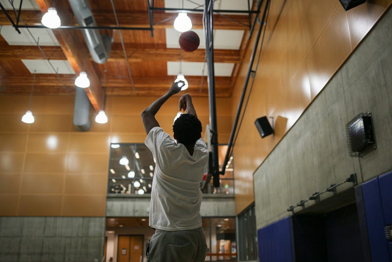 The MAC gym continues to get quieter as more students leave and as Jeff nears shot number 100 of 1300. 