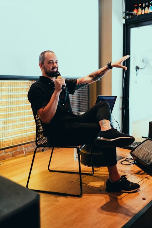 A speaker addressing an audience during the AI Startup School seminar series.