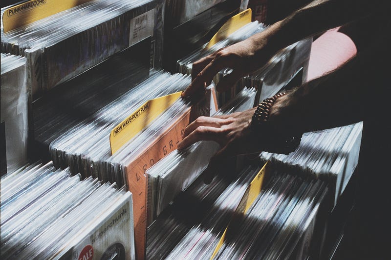 pictured: not me, flipping through vinyl albums