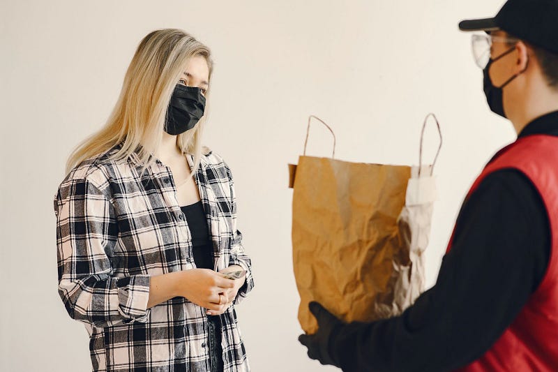 two people wearing masks to qualify for safety incentive programs