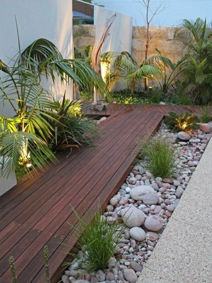 moderne-gartengestaltung-mit-holz-gartenpfade-und-steine