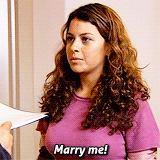 GIF of woman saying "Marry me!"