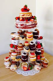 Cupcakes designed on tiers resembling a big Christmas Cake