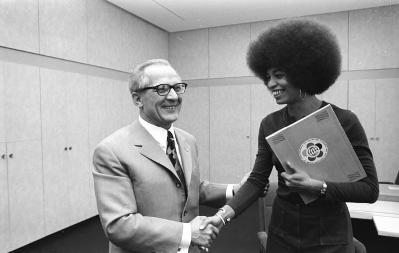 Photo Angel Davis and Erich Honecker shaking their hands in GDR in the year 1972.