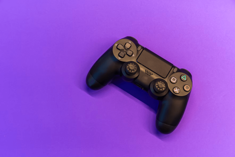 DualShock controller on purple background