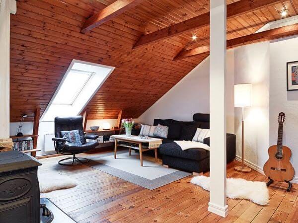 Scandinavian wood attic with white fur rug