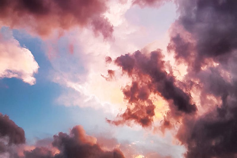 Beautiful sky with coloured clouds.