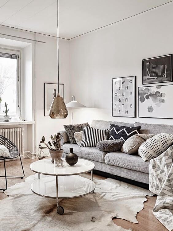 Neutral Nordic living room with copper light feature