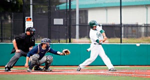 Laney College leadoff hitter Eli Alcantar swings at a pitch during the Eagles' 9-6 victory over Solano College on April 14.