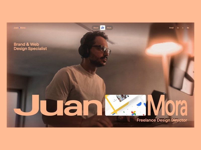 Personal portfolio homepage featuring a designer working at a desk, with large typography displaying “Juan Mora” and a warm, minimal layout.
