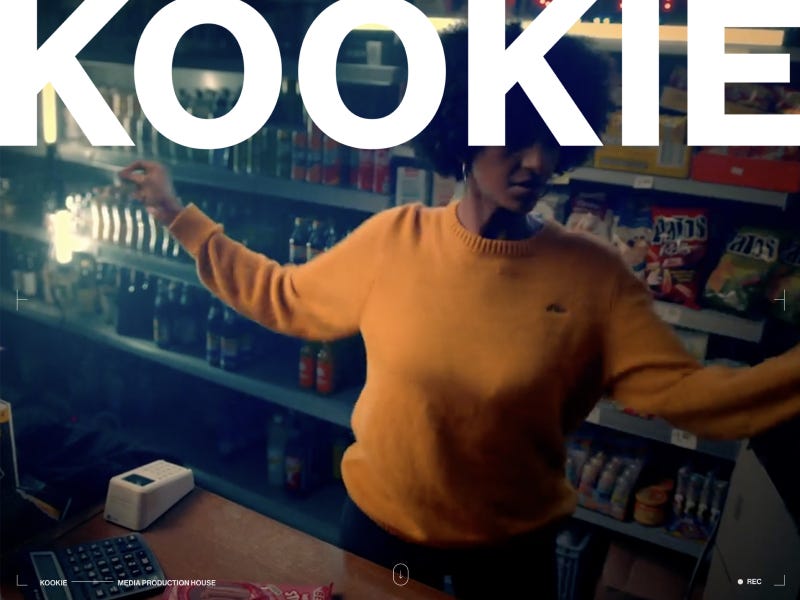 KOOKIE production website featuring cinematic scene of a person moving inside a shop, overlaid with bold oversized typography and film-style interface elements