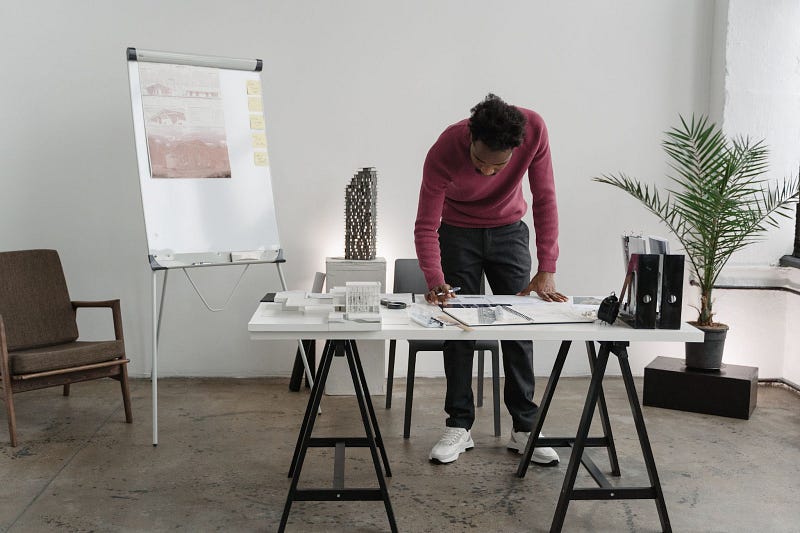 a project coordinator working on a white table