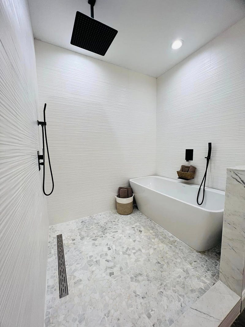 Bathroom of Osceola County, Florida Barndominium by Leslie Mintrone 
