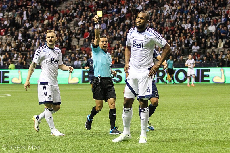 Waston gets a 2nd yellow.