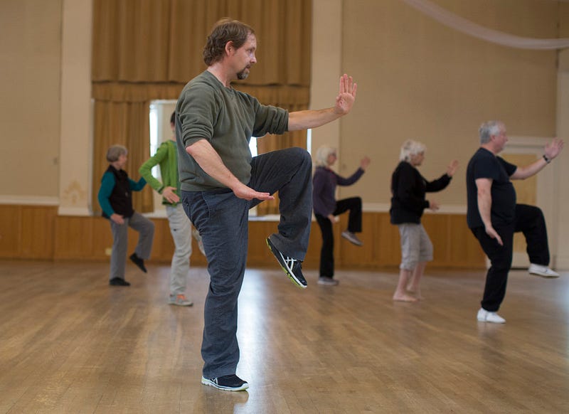 Tai Chi instructor Art Baner, center, leads a Tai Chi class on Wednesday, April 29, 2015 at the Majestic banquet hall in Bellingham, Washington. Baner has been practicing the Chinese martial art for more than 25 years. Jake Parrish / Klipsun Magazine 