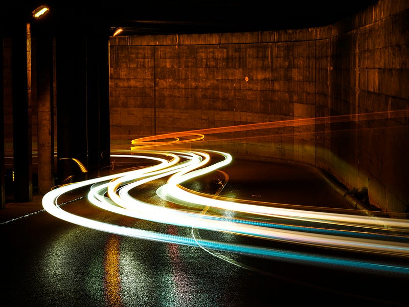 Lights zooming in the dark.