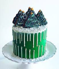 A yummy bake piece on plate of china clay. Beautiful edible metallic green topper