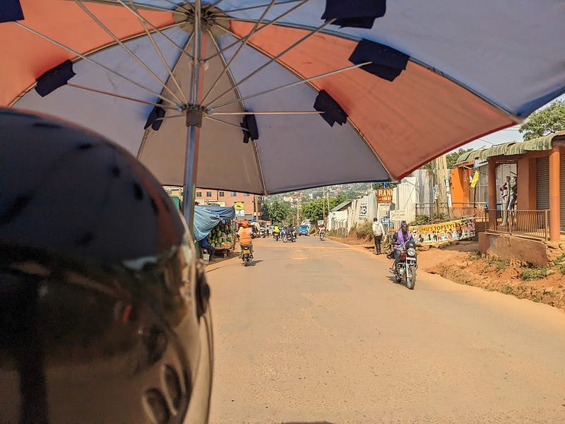Staying shaded in Kampala. Credit: author.