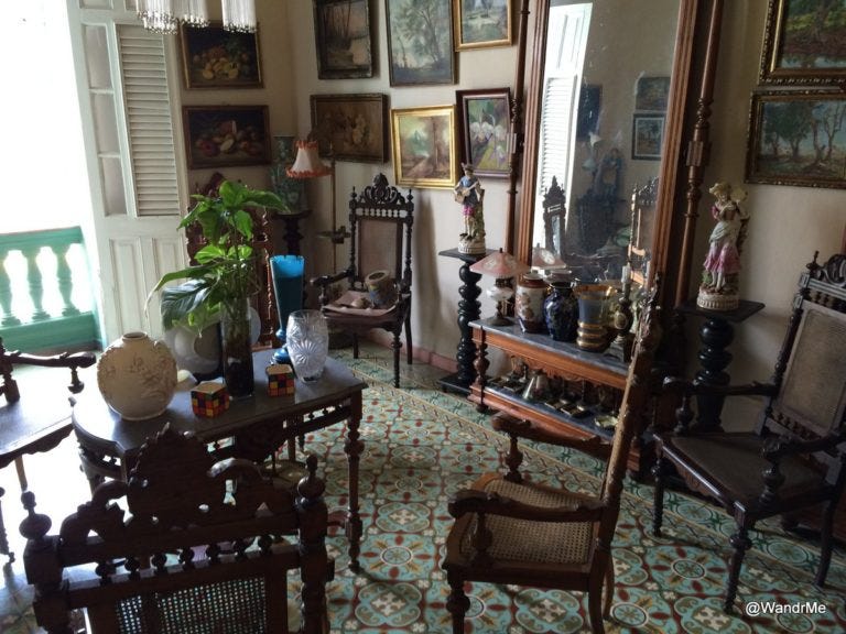 "Junkyard chic' collection of random stuff in Hostal Florida Center's lobby area