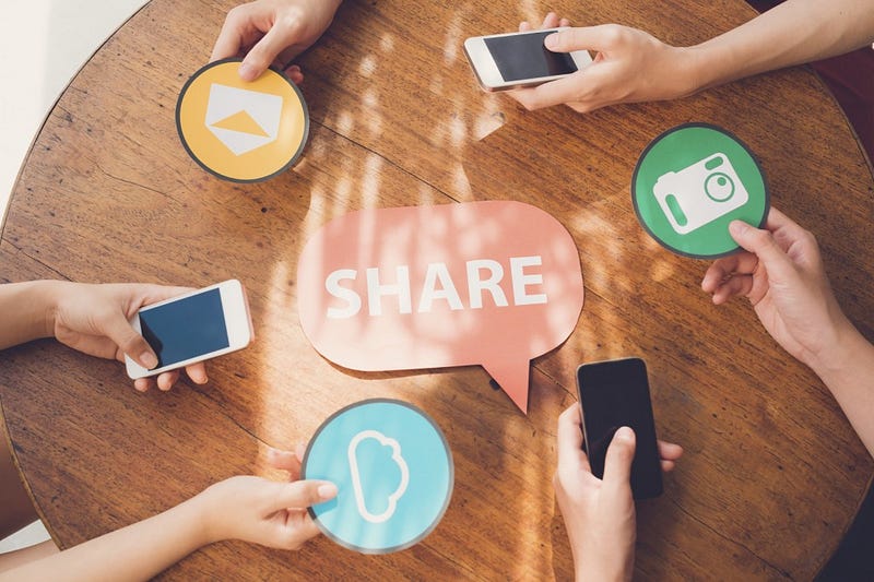 People sharing files via smartphones: internet and technology concept