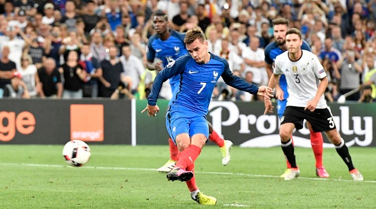 France's Antoine Griezmann scores the opening goal from the penalty spot during the Euro 2016 semifinal soccer match between Germany and France, at the Velodrome stadium in Marseille, France, Thursday, July 7, 2016. (AP Photo/Martin Meissner)