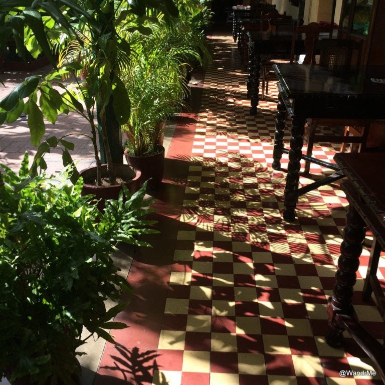 Enjoying a quiet moment in the courtyard at the Hostal Florida Center in Santa Clara, Cuba