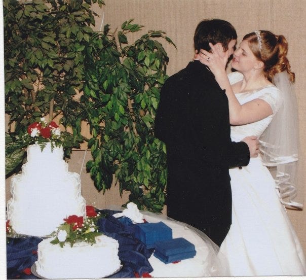 Becky kisses her new husband during her reception.