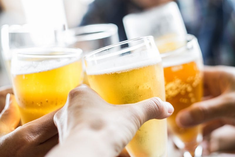 A group of co-workers go drinking in Japan after a long day at the office