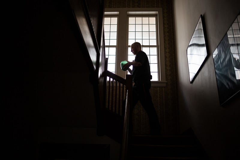 After preparing a salad for himself, Altenhofen steps out of the kitchen to spend some time alone. Despite much of his occupation involving public speaking, Altenhofen considers himself an introvert. 