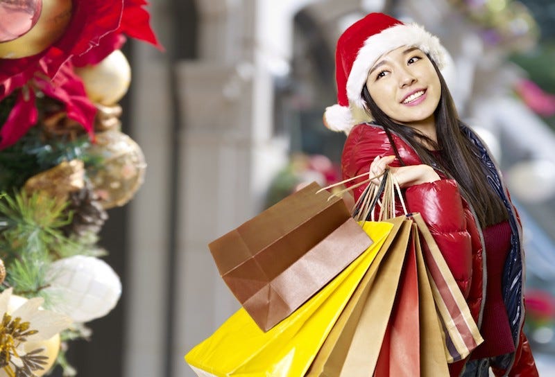 An woman goes shopping in Japan around Christmas time