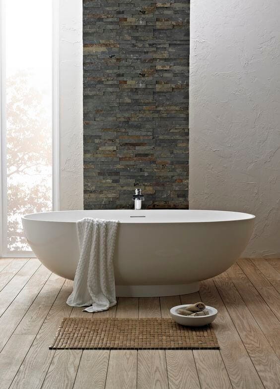 Feature bath in Scandinavian style bathroom