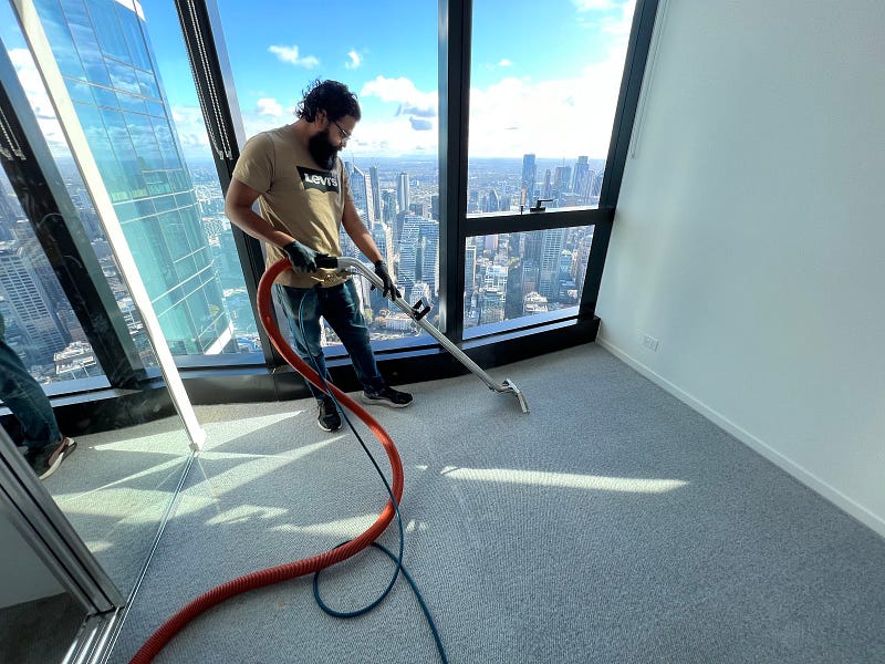 Cleaners tidying up office space
