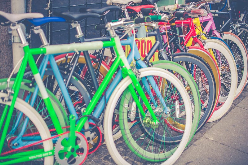 Row of bicycles in a rainbow of colors