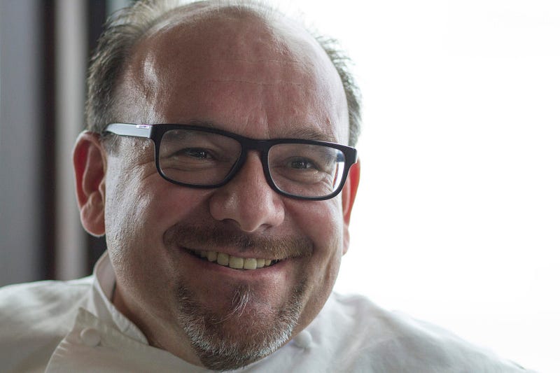 Culinary director at Semiahmoo Resort, Eric A. Truglas, smiles as he speaks about his passion for food and cooking in Packers Oyster Bar.