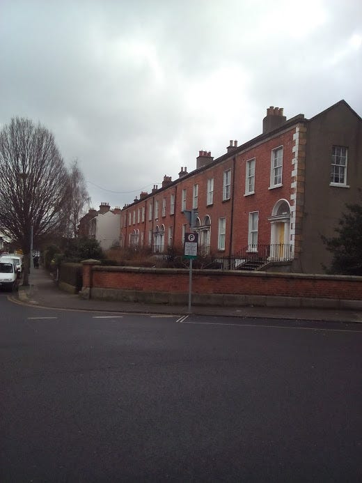 Terrace of houses on Belgrave Road, including No 9, built by Patrick Plunkett in 1855.