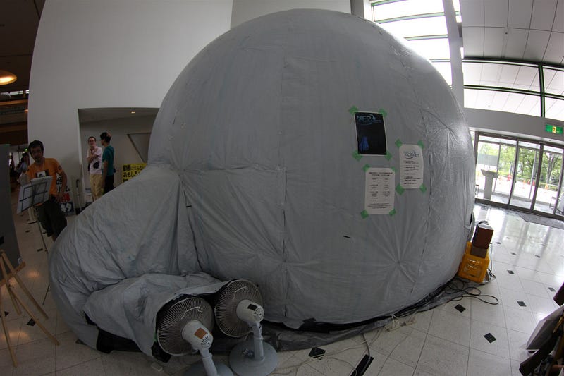 DIY Inflatable dome by greenhouse plastic. He made an amazing 3D show
in there.