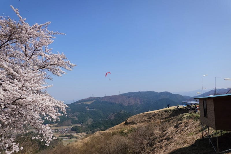 While it’s no Mount Fuji, paragliding is a great way to look down at the great view of the peaks