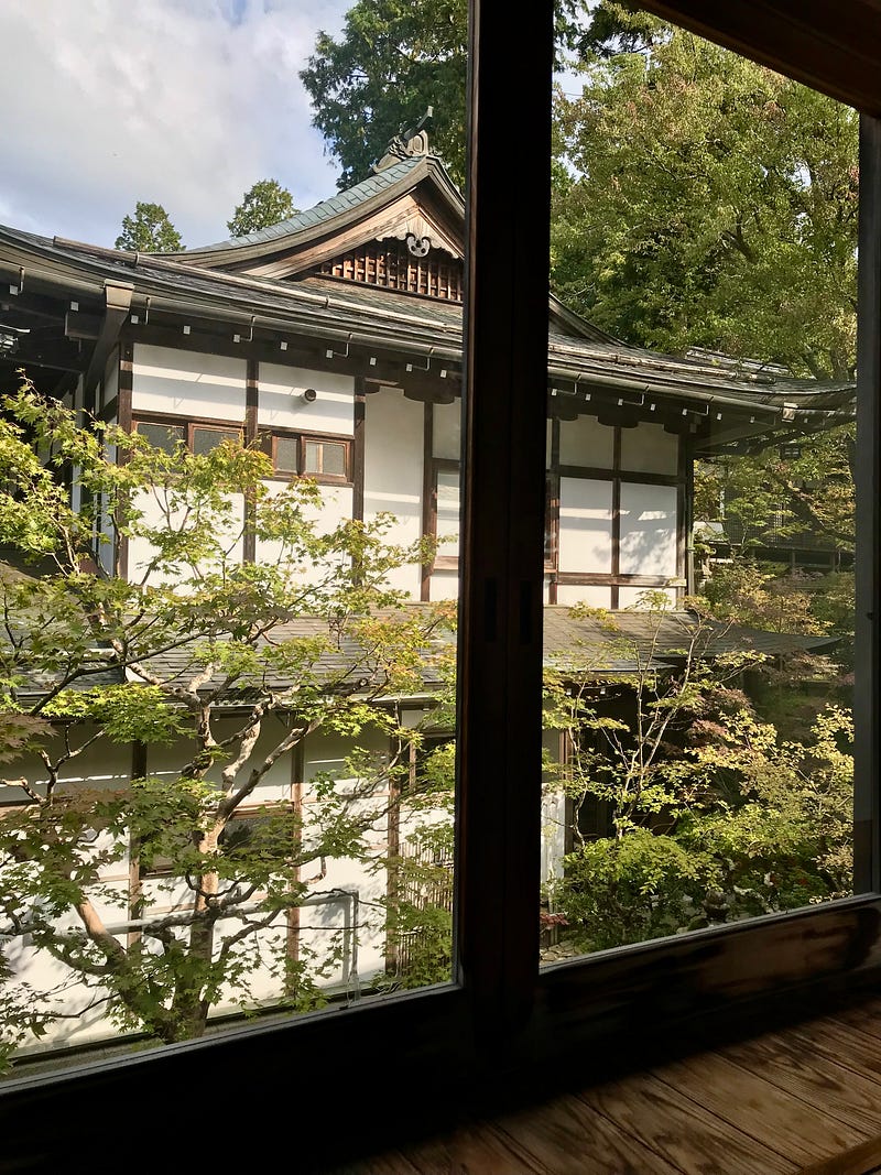 During my shukubō temple stay, my quiet room had a view of the courtyard and temple buildings.
