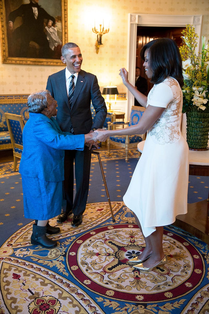 Feb. 18, 2016 “President Obama watches the First Lady dance with 106-year-old Virginia McLaurin in the Blue Room of the White House prior to a reception celebrating African American History Month.” (Official White House Photo by Pete Souza)
