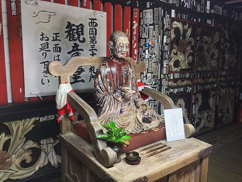 A wooden statue of the Medicine Buddha on Shiga Prefecture’s island of Chikubushima