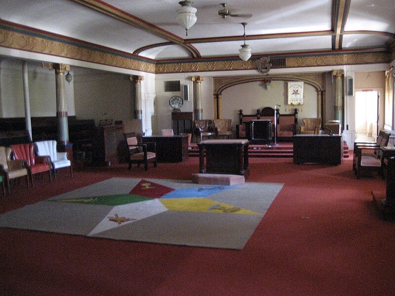 Picture of the inside of a Masonic temple in Spokane, Washington with the symbol of the Order of the Eastern Star on the floor.