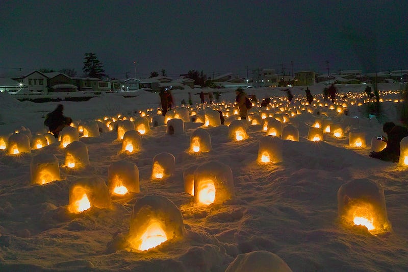 Hundreds of small snow huts are lit up for Akita Prefecture’s Kamakura Festival