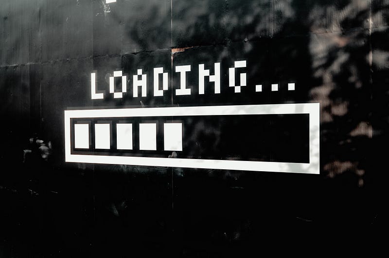 White loading text on black background.