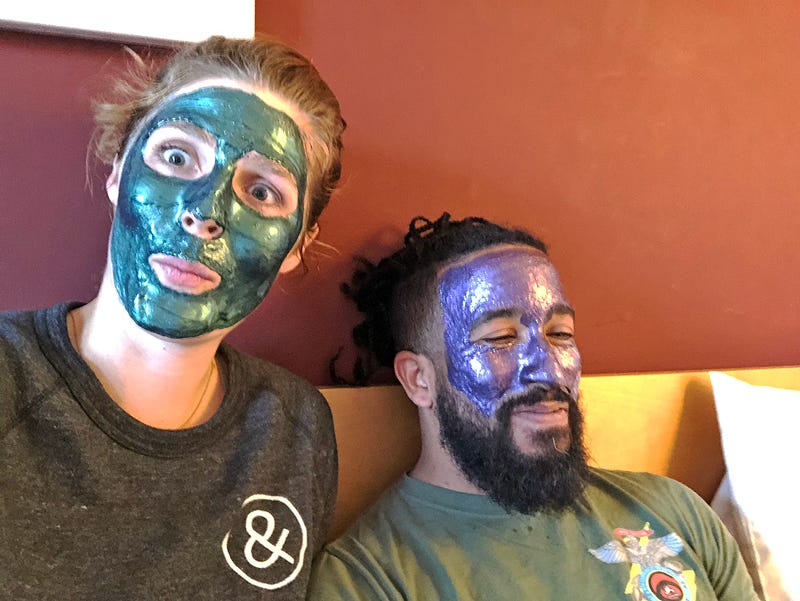 Selfie of Arden and Eduardo in face masks.