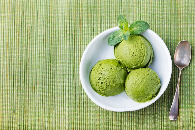 Travelers in Japan eat matcha flavored ice cream during the summer months