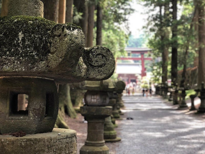 Stone lanterns line the entrance to Yamanashi Prefecture’s Kitaguchi Hongu Fuji Sengen Shrine