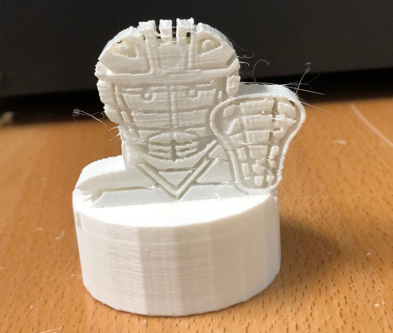 Photo of a 3D printed figurine of a hockey player that students made at a makerspace using a Noun Project icon